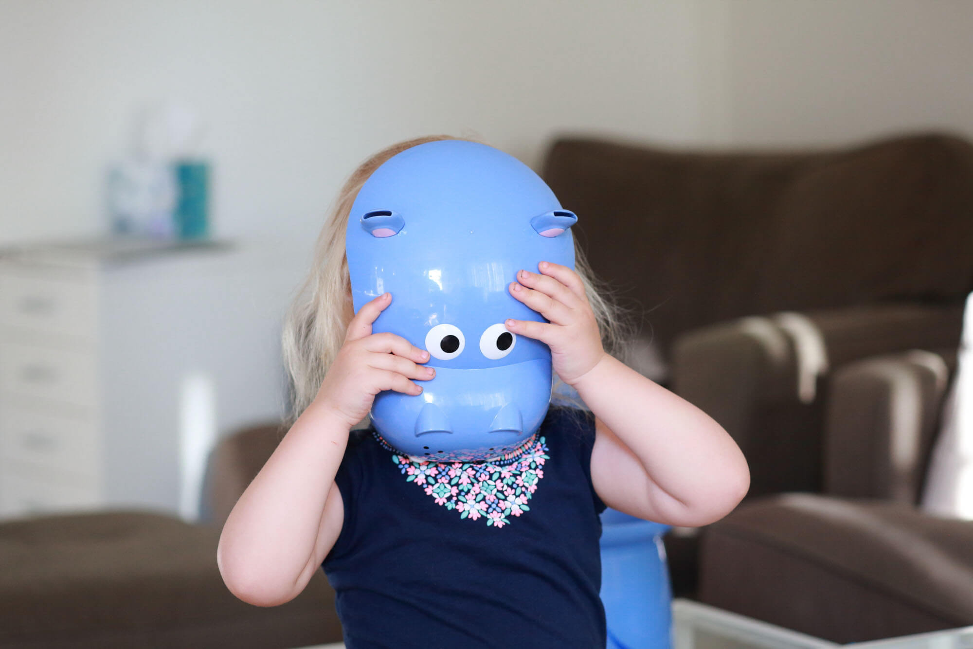 Wearing the Crane's hippo top as a mask