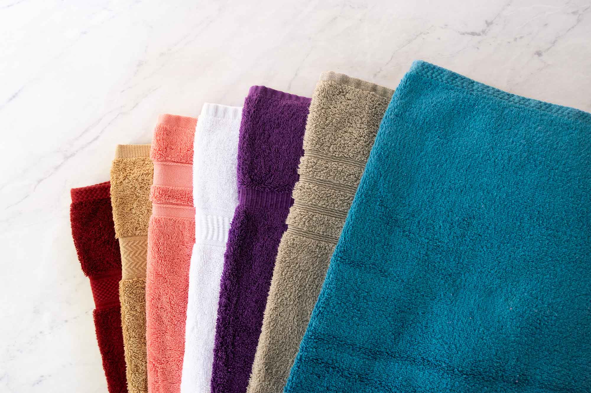 bath towels fanned out in multiple colors