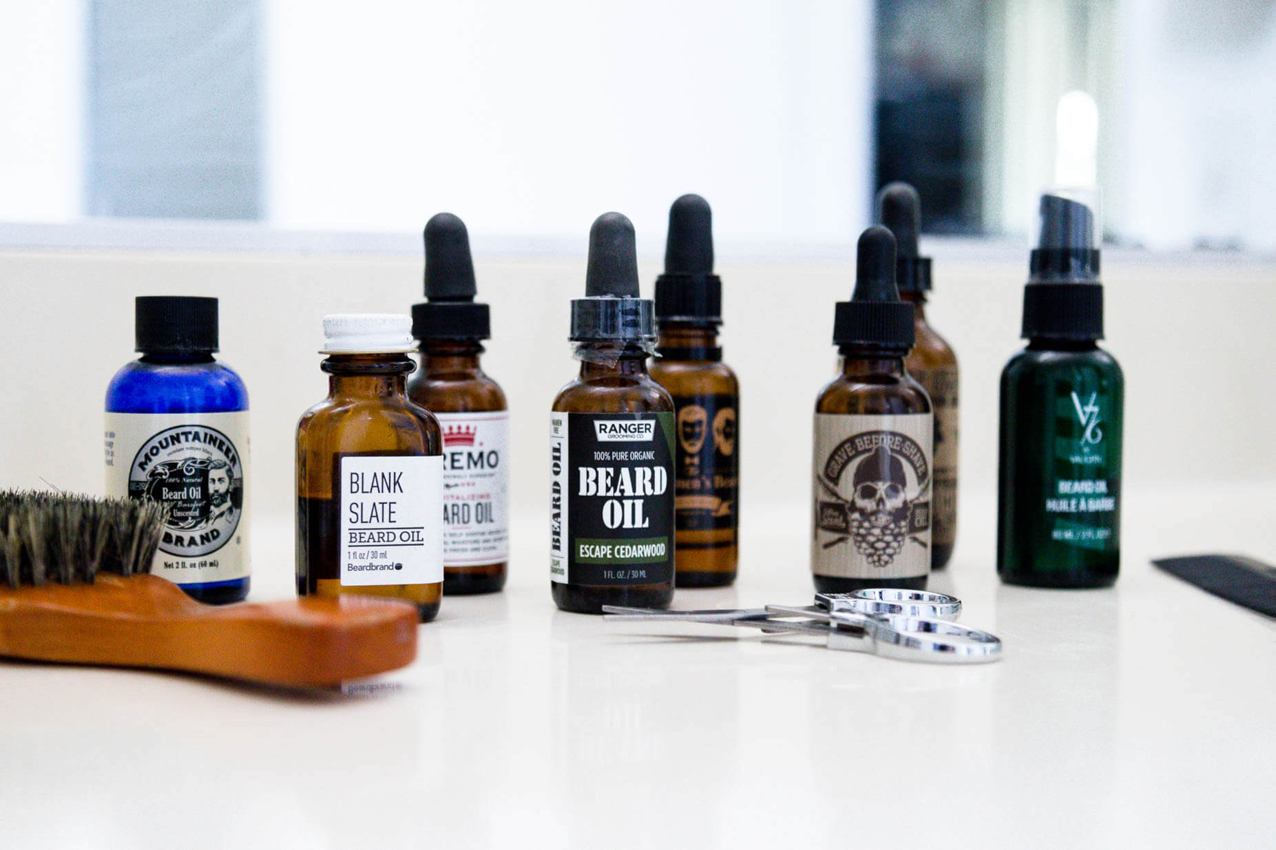 Group of beard oils on counter