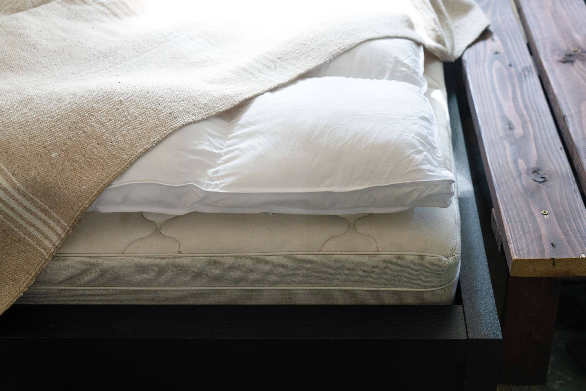 Cheer Collection mattress topper installed under bedspread