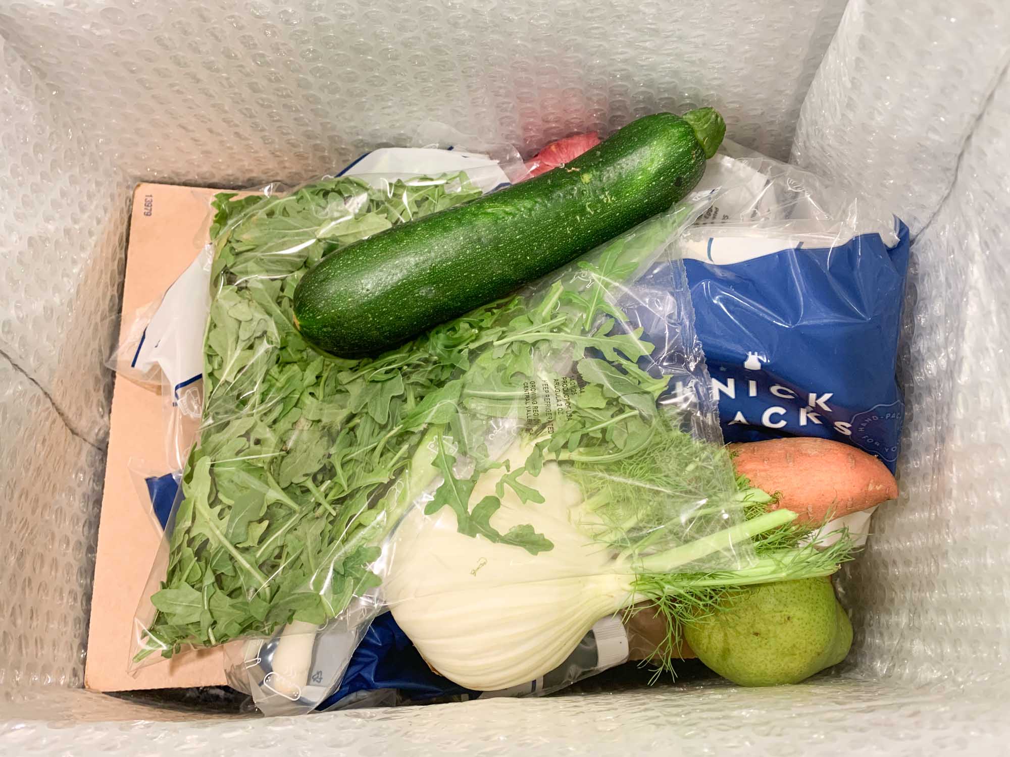 haphazardly packaged ingredients from Blue Apron