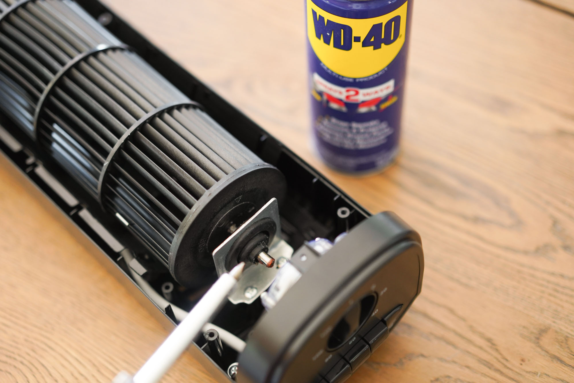 can of WD-40 next to bearing area to be sprayed