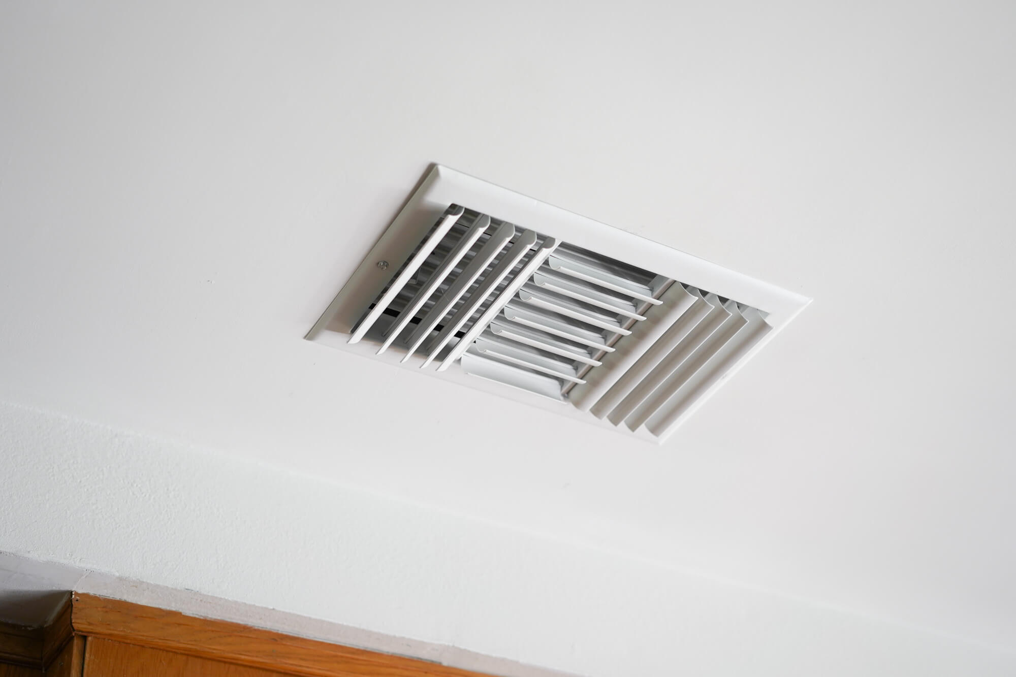 a duct vent in the ceiling