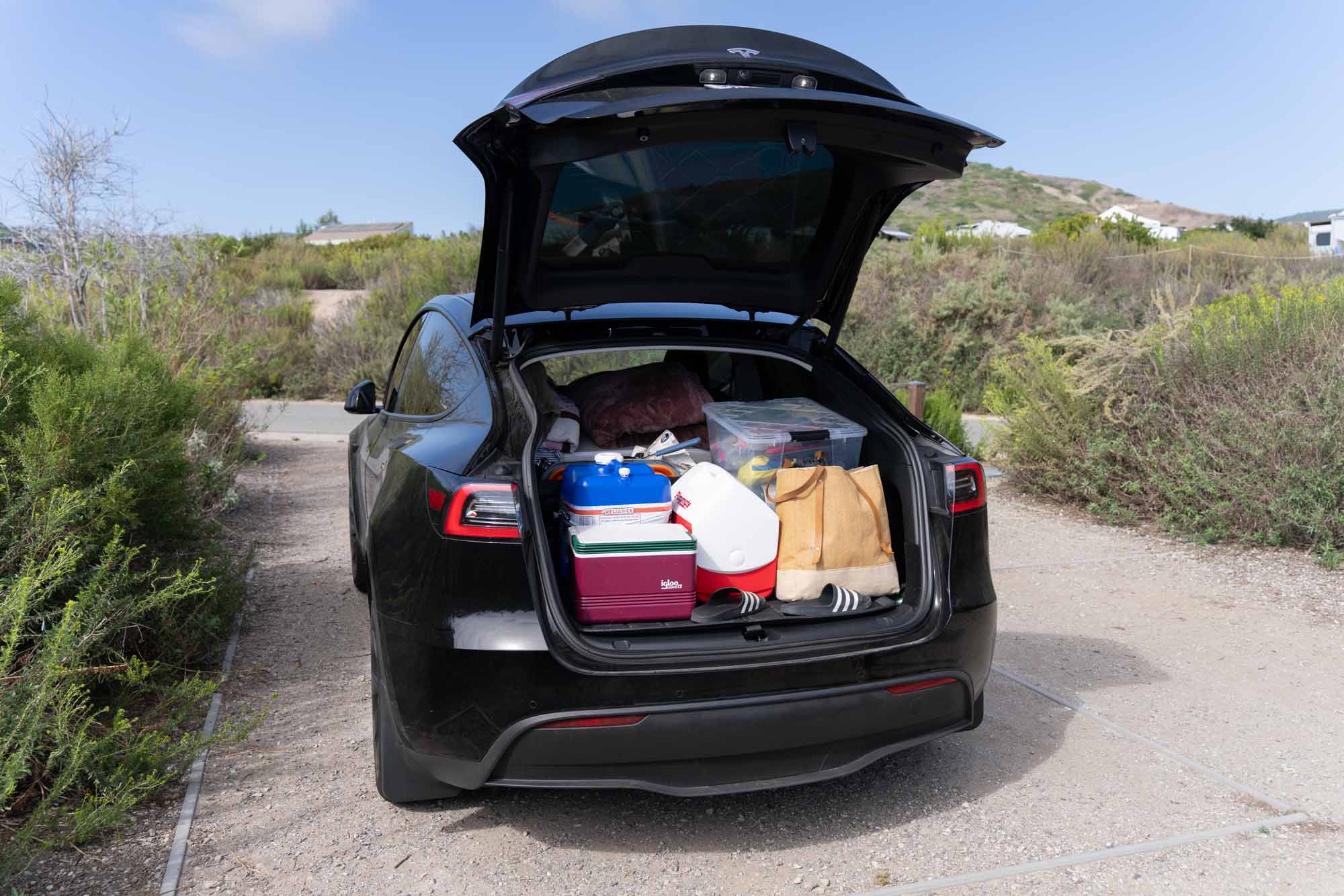Model Y trunk packed for camping